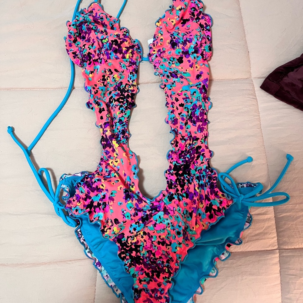Never worn multi color Victorias Secret one-piece